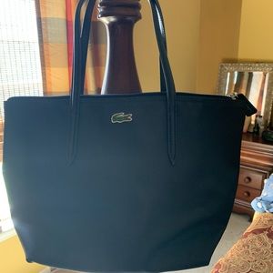Navy zip up Lacoste purse
